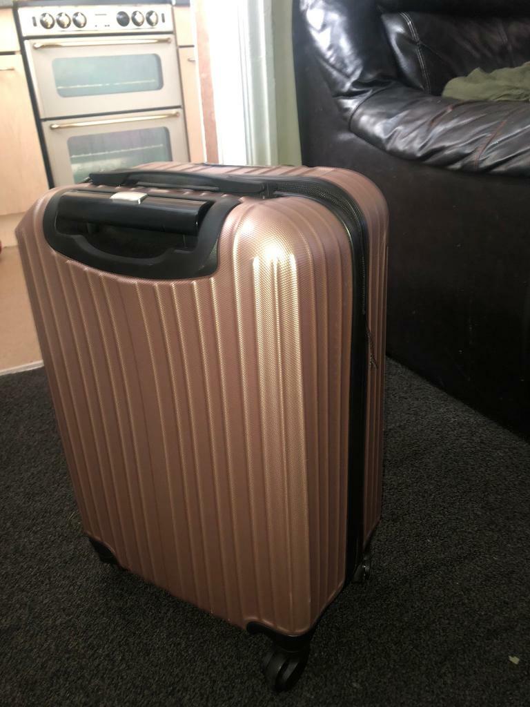 rose gold tripp suitcase